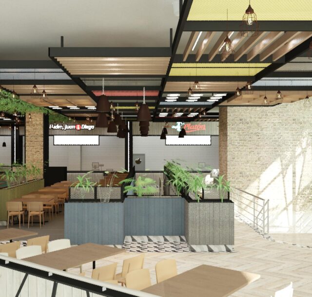 Espacio de food court en un centro comercial, con techos decorativos, luminarias colgantes, vegetación interior y mesas de diferentes estilos, junto a locales de comida rápida al fondo.