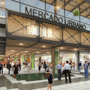 Entrada principal de Mercado Urbano, con fachada de vidrio, estructura metálica moderna, detalles de vegetación colgante y personas recorriendo un espacio comercial amplio y luminoso